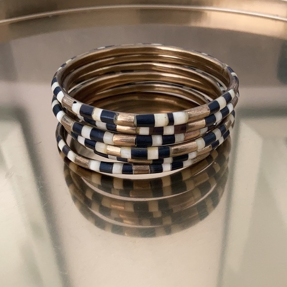 FREE with purchase.  Black and brass bangles - Picture 1 of 4